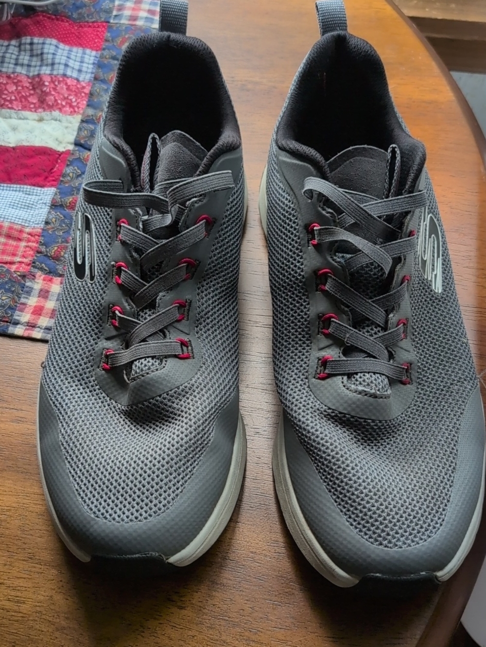 Skechers Men's Charcoal Gray Mesh Sneakers with Red Eyelet Accents